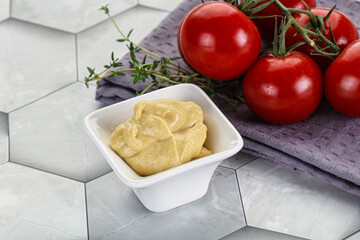 Dijon mustard sauce in the bowl