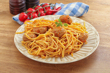 Spaghetti with meatball in tomato sause