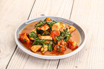 Chicken with tomato and spinach