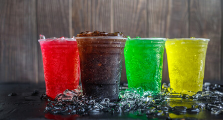 Low-angle view of A lot of Soft drinks in colorful and flavorful glasses on the table,Soft drinks...