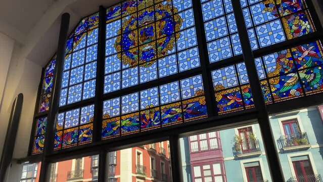 Video of a colorful stained glass design in a market in Bilbao, Spain