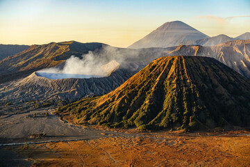 Bromo and Semeru Volcanoes on clean sunrise, with smoke in crater in Taman Nacional Park on Java island in Indonesia © Kosma Sobol