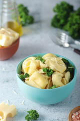 A bowl with Italian dumplings - tortellini