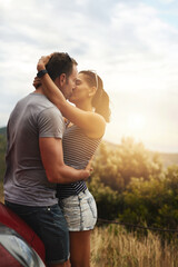 Road trip, love or couple kiss in park for date, support or care on a summer romance or adventure. Relax, hug or man with woman on outdoor holiday vacation together for bond, travel or breka