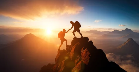 Tuinposter Help and assistance concept. Silhouettes of two people climbing on mountain thanks to mutual assistance and teamwork and partnership. business success and teamwork concept in company © Celt Studio