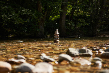 River pebbles stacked in towers
