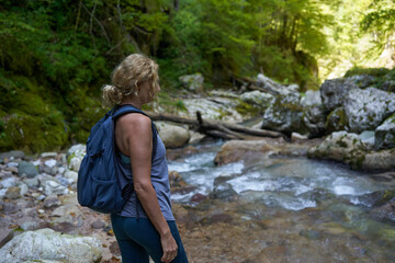 Womah hiker exploring a gorge
