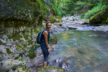 Womah hiker exploring a gorge