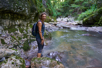 Womah hiker exploring a gorge