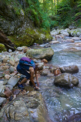 Womah hiker exploring a gorge
