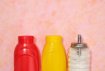 Mustard and ketchup, sugar on table. Flat lay composition. Copy space for text.