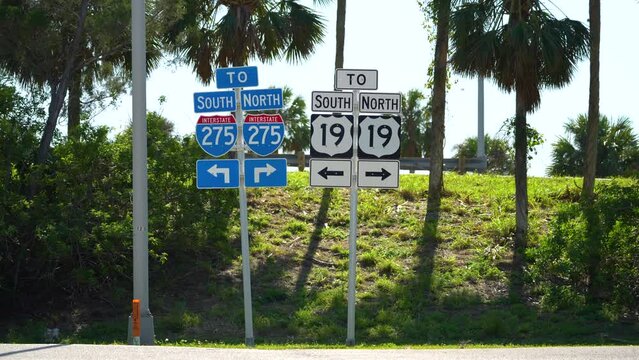Blue directional road sign indicating direction to I-275 freeway interstate highway serving the Tampa Bay area in Florida