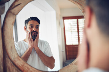 Mature man, mirror and reflection in bathroom with thinking, wellness and beard for skincare, ideas...