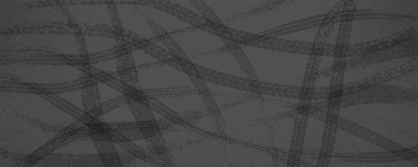 Parallel tire skid marks on a dark gray asphalt road. Abstract vector background with grunge texture © Kusandra