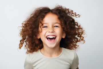 little girl laughing and happy over isolated background