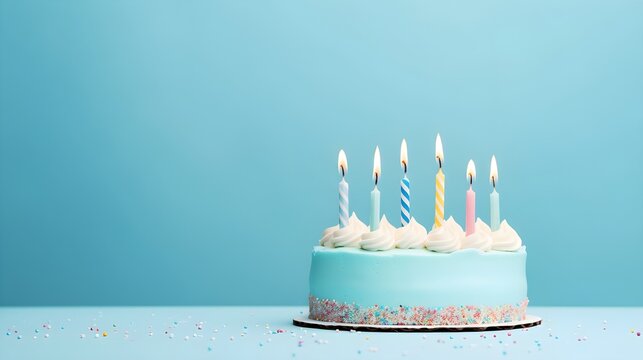 cake with candles, birthday cake with candles on pastel blue background