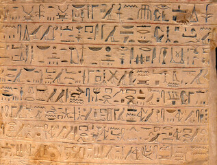 Fototapeta na wymiar Ancient letters in the pyramid