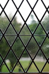 Window with triangular glass in the background