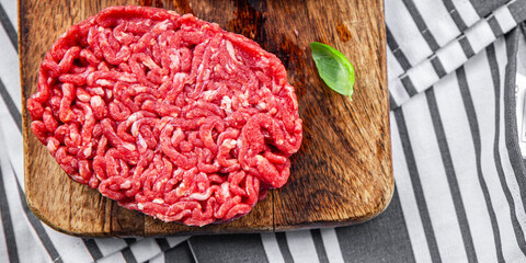 raw cutlet fresh beef meat hamburger delicious healthy eating cooking appetizer meal food snack on...