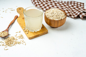 A fermented drink made from oats, beneficial for the body, kvass or infusion. Free space, light...