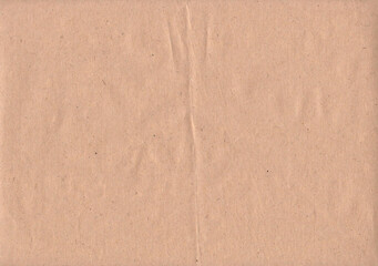A sheet of craft paper, a bit crumpled in the middle. Good for backdrops.
