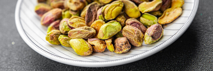 fresh pistachios peeled without shell nut eating cooking appetizer meal food snack on the table copy space food background rustic top view 