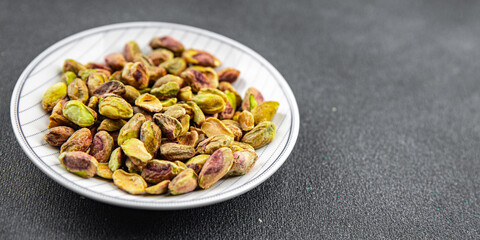fresh pistachios peeled without shell nut eating cooking appetizer meal food snack on the table copy space food background rustic top view 