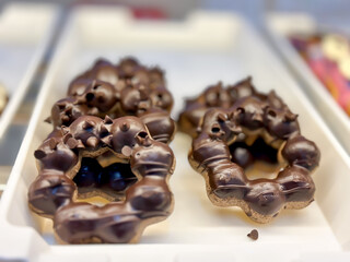 Donut sweet deserts donuts bright color on market concept.