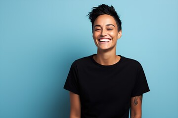 Portrait of a fictional androgenous person smiling candidly isolated on a blue background. Generative AI.