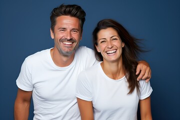 Fototapeta premium Young fictional white couple smiling. Isolated on a plain blue background. Generative AI.
