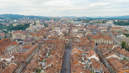 Fototapeta na wymiar Bern, Switzerland. The famous Zytglogge tower. Panorama of the city with a view of the historical center. Summer morning, Aerial View