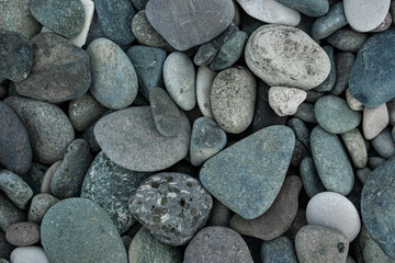 Beach Gems: Detailed Pebble Texture Reflecting the Serenity of the Seashore