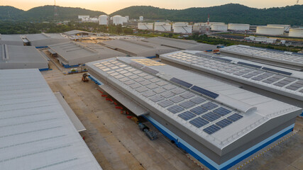 Top view Solar Panels on Warehouse Factory. Solar photo voltaic panels system power or Solar Cell...