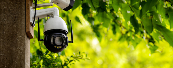 Online Security CCTV camera surveillance system outdoor of house. A blurred night city scape background. Real time Modern CCTV camera on a pole. Equipment system service for safety life or asset. - obrazy, fototapety, plakaty