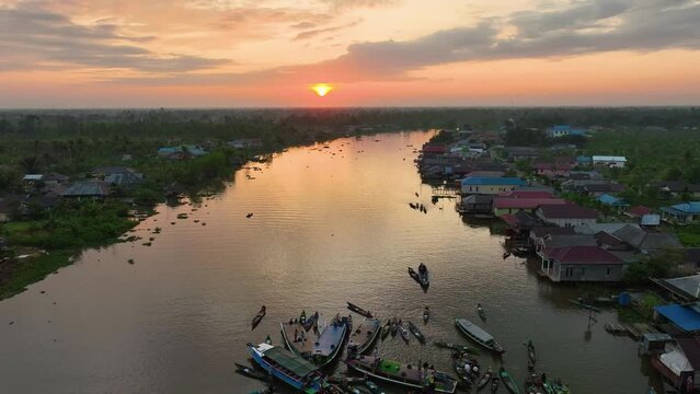 Floating market activities in Lok Baintan, South Kalimantan shot from drone
