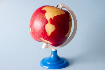 Globe made of apple, creative concept