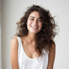 photography of a dark haired model beautiful woman with white background, lifestyle, smiling