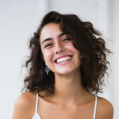 photography of a dark haired model beautiful woman with white background, lifestyle, smiling