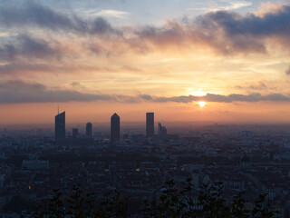 Cloudy and foggy sunrise over Lyon skyline, view from Fourviere hill, Lyon, France