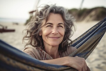 Smiling woman leaning on railing