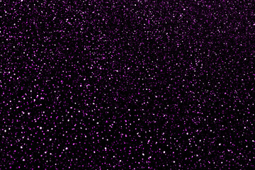 Purple violet stars in space. Purple glitter background.  Galaxy space background. Glowing stars in the night. New Year, Christmas and all celebrations background concept.