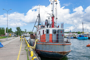 fishing vessel in the port of Leba - obrazy, fototapety, plakaty