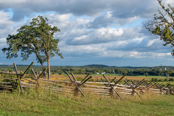 wooden fence in field