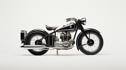 Timeless elegance! A black classic motorcycle stands out against a white backdrop, celebrating vintage style