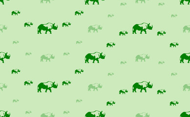 Seamless pattern of large and small green rhinoceros symbols. The elements are arranged in a wavy. Vector illustration on light green background