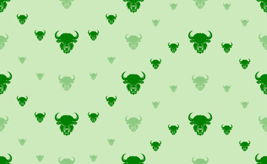 Seamless pattern of large and small green buffalo heads. The elements are arranged in a wavy. Vector illustration on light green background