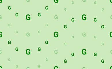 Seamless pattern of large and small green capital letter G symbols. The elements are arranged in a wavy. Vector illustration on light green background