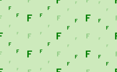 Seamless pattern of large and small green capital letter F symbols. The elements are arranged in a wavy. Vector illustration on light green background