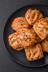 Delicious crispy mini puffs with sausage or meat with salt, thyme and sesame