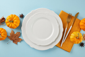 Prepare a Thanksgiving table worth remembering. Top view photo of pumpkins, plates, cutlery,...